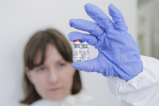 This handout picture taken on August 6, 2020 and provided by the Russian Direct Investment Fund shows the vaccine against the coronavirus disease, developed by the Gamaleya Research Institute of Epidemiology and Microbiology.
