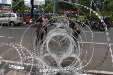 Jakarta braces for large protests as House rushes jobs bill to final stage