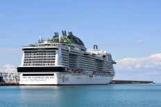 A view taken on March 25, 2020 shows the MSC Grandiosa cruise ship docked at the port of Civitavecchia, some 70kms northwest of Rome, during the country's lockdown aimed at curbing the spread of the COVID-19 infection, caused by the novel coronavirus. 