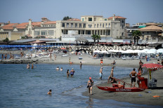 People cool off at Ostia seaside in the outskirts of Rome on Aug. 1, 2020 as Italy is in the grip of a heat wave.
