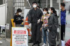 Church says will sue Seoul over COVID-19 contact tracing