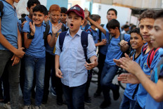 Gaza rapper, 11, strikes chord with rhymes about war and hardship