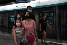 Beijing says residents can go mask-free as China COVID cases hit new lows