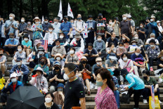 South Korea COVID-19 infections 'in full swing' after protest outbreak