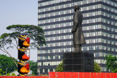 Jakarta reschedules plan to attach face mask to Sudirman statue
