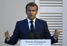 French president Emmanuel Macron speaks at the press conference after a meeting with German Chancellor Angela Merkel at Fort de Bregancon, in Bormes-les-Mimosas, south-east of France, on August 20, 2020. French president Emmanuel Macron meets German Chancellor Angela Merkel to try to strengthen the understanding of the Franco-German couple on the many hot European and international issues.
