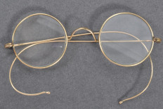 A handout picture released by East Bristol Auctions on August 19, 2020 shows a pair of glasses that once belonged to Indian independence icon Mohandas Karamchand Gandhi photographed at the action house in Bristol head of their sale. 