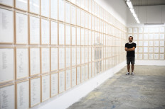 Serbian artist Vladimir Miladinovic poses at his exhibition in Belgrade on August 11, 2020. 