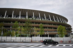 Japan athletes give Tokyo Olympic stadium a test run