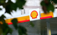 Shell annual profit more than halves to $19.4 billion