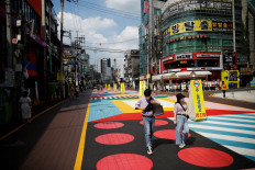 S. Korea urges work from home as country reports most daily cases since March