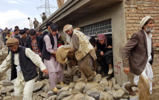 Rescuers scour mud-clogged debris for Afghan flood victims; 150 dead