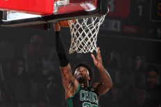 Marcus Smart #36 of the Boston Celtics shoots the ball against the Toronto Raptors during Game One of the Eastern Conference SemiFinals of the NBA Playoffs on Sunday at The Field House in Orlando, Florida.