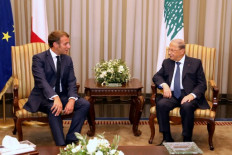 Macron in Lebanon calls for speedy government formation