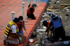 In Indonesia, coronavirus floods Cisadane River with extra hazard: Medical waste