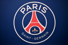 This file photo taken on Sept. 6, 2017, shows the logo of the Paris Saint-Germain's (PSG) L1 football club at the Parc des Princes stadium in Paris. - Three Paris Saint-Germain players have tested positive for COVID-19, the French club announced on Sept. 2, 2020.