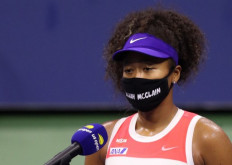 Naomi Osaka of Japan wears a mask with the name Elijah McClain on it following her Women's Singles second round win against Camila Giorgi of Italy on Day Three of the 2020 US Open at the USTA Billie Jean King National Tennis Center on Wednesday in the Queens borough of New York City. McClain was killed by police in Aurora, Colorado.   
