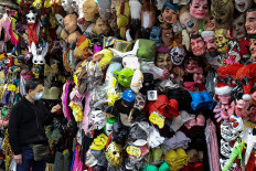 Virus cases in hard-hit Australian state reach lowest in months