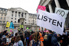 Extinction Rebellion activists gather during a protest, amid the outbreak of the coronavirus disease (COVID-19), outside the Bank of England in London, Britain, on September 4, 2020. 