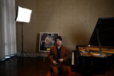 Chinese pianist Lang Lang says Bach the remedy for troubled times