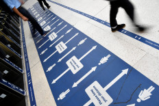 England tightens socializing rules as COVID infections rise