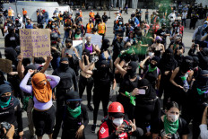 Demanding justice, feminist activists occupy offices in Mexico