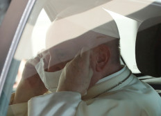 Pope wears mask, warns against political exploitation of coronavirus