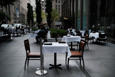 A table stands empty at a restaurant in Manhattan on August 31, 2020 in New York City. 
