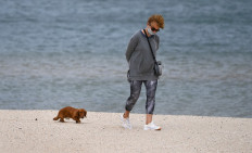 Virus curfew to be lifted in Australia as global deaths near a million