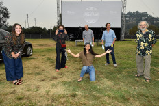 (L-R) Taylor Friedman, Frances McDormand, Chloé Zhao, Matthew Greenfield, David Greenbaum, and Fox Searchlight Co-Chairman Stephen Gilula attend the Drive-In Premiere of 'Nomadland' hosted by Fox Searchlight and The Telluride Film Festival at Rose Bowl on September 11, 2020 in Pasadena, California. 