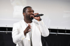 50 Cent hands out over $30,000 in cash to fast-food workers