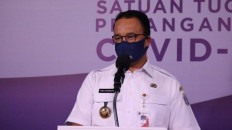 Jakarta returns to transitional PSBB as Anies claims ‘flattened' COVID-19 curve