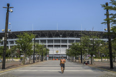 A man exercises at the Gelora Bung Karno (GBK) Sports Complex (GBK) on Sept. 13, 2020, in Senayan, Central Jakarta.