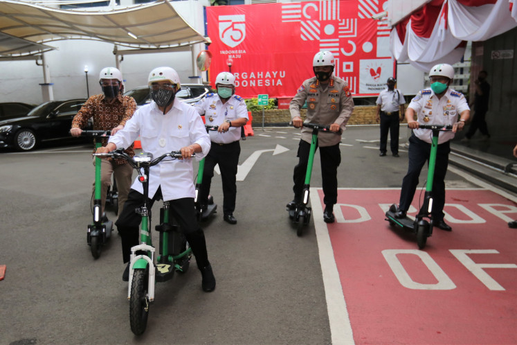 Test-drive: GrabWheels electric scooters were taken for a test-drive at the Transportation Ministry after its relaunch on Thursday.