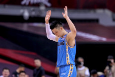 This photo taken on August 4, 2020 shows Beijing Ducks' Jeremy Lin reacting during the Chinese Basketball Association (CBA) match between Beijing Ducks and Guangdong Southern Tigers in Qingdao in China's eastern Shandong province. 