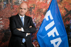 FIFA president Gianni Infantino gestures as he speech during the sign memorandum of understanding with World Health Organization (WHO) aimed at promoting and protecting public health globally through football, on Oct. 4, 2019 in Geneva.
