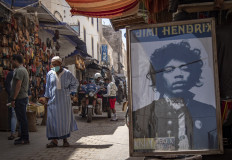 A picture taken in the Moroccan coastal city of Essaouira shows portraits of late US guitarist Jimi Hendrix on September 10, 2020. 
