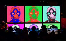 Gaming fans play 'Borderlands 3' for Microsoft Windows, PlayStation 4 and Xbox One at the 2019 Electronic Entertainment Expo, also known as E3, opening in Los Angeles, California on June 11, 2019. 