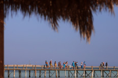 Tourists enjoy a day by the beach during their summer vacation at a Red Sea resort, amid the coronavirus disease (COVID-19) outbreak, in Hurghada, Egypt, on August 25, 2020. 