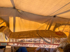 A handout picture released by the Egyptian Ministry of Antiquities on September 20, 2020, shows one of fourteen 2500 year-old coffins discovered in a burial shaft at the desert necropolis of Saqqara south of the capital.