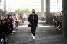 Valentino picks Milan over Paris for rare live fashion show