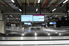 A luggage conveyer belt in the arrival area of Terminal 2 is seen during a press visit at the Berlin-Brandenburg Airport BER in Schoenefeld near Berlin on September 25, 2020.