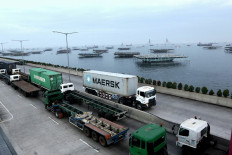 Working at height: Employees work at the construction site of the Wuhan Greenland Center in Wuhan in China's central Hubei province on Aug. 26. China’s reform and opening up 40 years ago has paid off as it now has emerged as the second-largest economy in the world. 