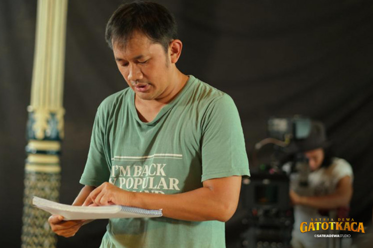 Behind the scenes: Director Hanung Bramantyo works at the shooting location in Yogyakarta.