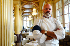 French chef Philippe Etchebest poses wearing a black armband in his restaurant Le Quatrieme Mur in Bordeaux, south-western France, on September 30, 2020. 