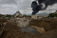Cities under fire as Armenia-Azerbaijan fighting intensifies 