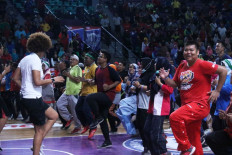 Let&rsquo;s get started: Participants in the February 2020 cohort of the Jr. NBA Coaches Academy in Surabaya, East Java, warm up before starting their coaching session.