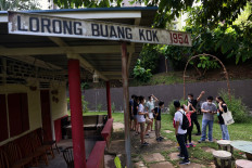 Local tourists tour Kampong Lorong Buangkok, the last remaining village in Singapore on October 3, 2020. 