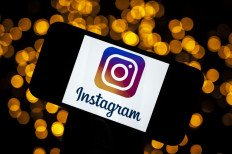 In this file photo taken on September 29, 2020, shows the logo of the social network Instagram on a smartphone, in Toulouse, France. 