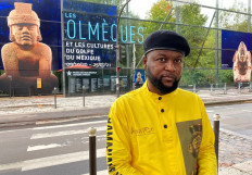 Congolese activist Mwazulu Diyabanza poses in front of the Quai Branly Museum-Jacques Chirac, a museum featuring indigenous art and cultures of Africa, Asia, Oceania and the Americas, in Paris, France, on October 2, 2020. 